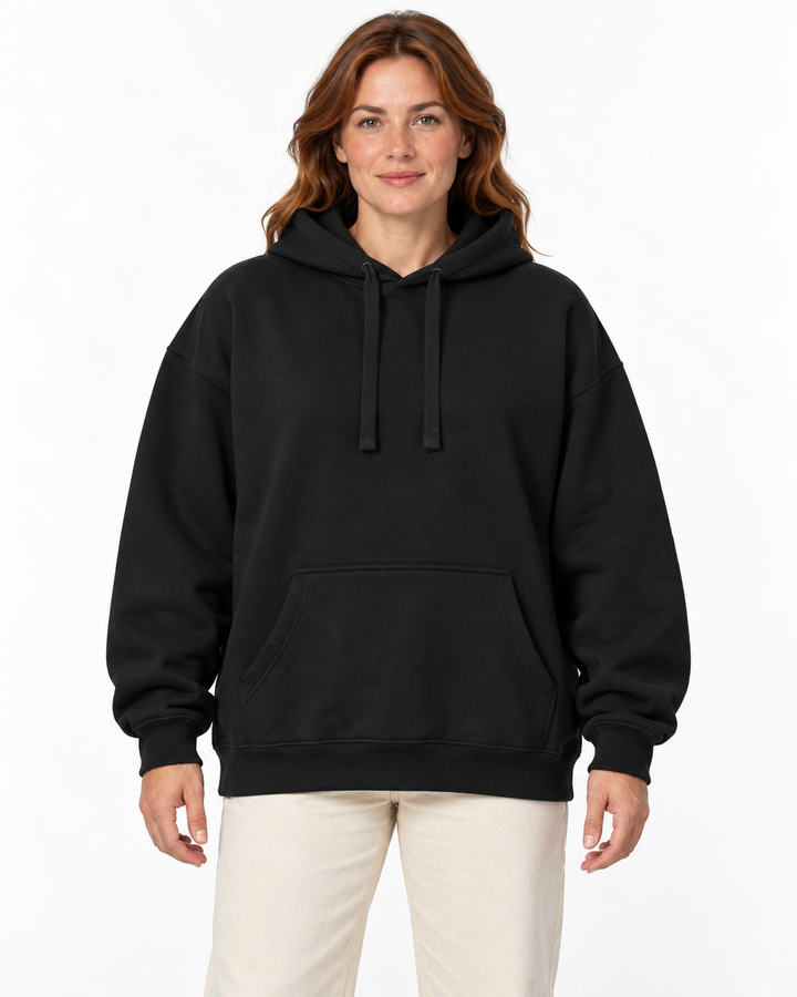 Sitztgut Damen-Hoodie aus Baumwolle, Oversized Fit – Schwarz – Vorderansicht mit weiblichem Model